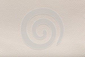 Beige leather texture used as background. High resolution photo