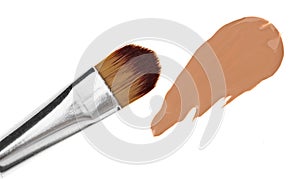 Beige liquid foundation makeup stroke with brush