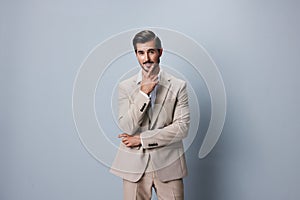 beige man white happy handsome smiling copyspace portrait suit business businessman