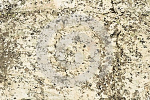 Beige natural stone texture with variegated stains