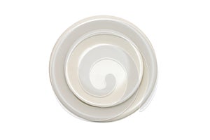 Beige plate and saucer isolated top view