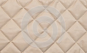 Beige quilted background