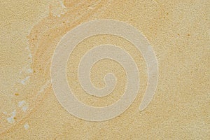 Beige sandstone wall background texture