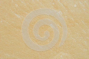 Beige sandstone wall background texture