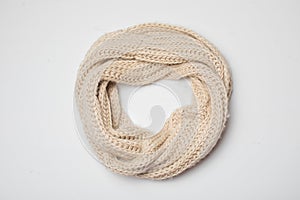 Beige scarf onn white, top view