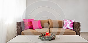 Beige sofa with advent flower arangement