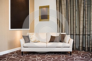 Beige sofa in luxurious living room