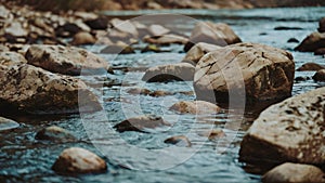 Beige stones in a stream