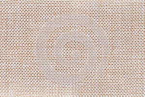 Beige textile background closeup. Structure of the fabric macro