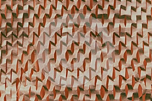 Beige textured background. Corrugated background on peach fuzz color. Ribbed pattern. Abstract paper background.