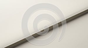 Beige textured surface with a diagonal shadow creating a subtle gradient effect. The