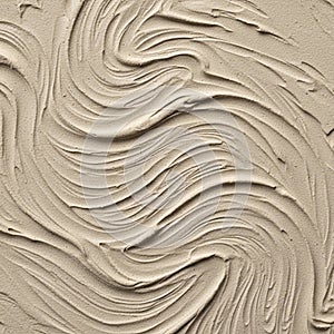 Beige textured surface with swirling patterns,