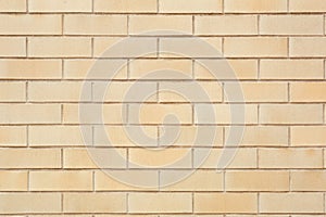 Beige tiled wall texture, background