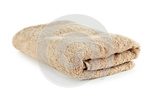 Beige towel isolated on a white