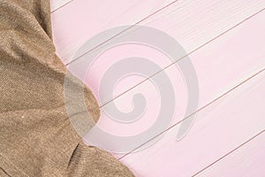 Beige towel over wooden table