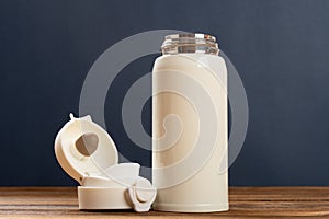 beige vacuum tumbler at horizontal composition