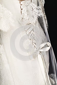 Beige wedding dress with lace. Details closeup