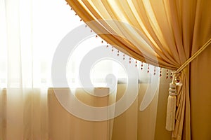 Beige window curtain