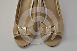 A beige women shoes