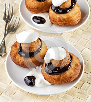 Beignets with chocolate and cream