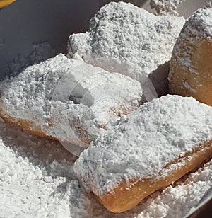 Beignets in powdered sugar