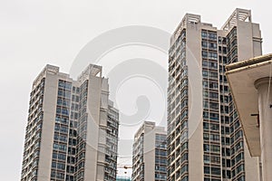 Beihai, China - July 18, 2019: Modern Chinese Apartment Building With Balconies in Residential Area