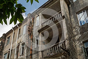 Beihai, China - July 24, 2019: Old Chinese Apartment Building in Residential Area