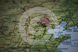 Beijing pinned on a map with flag of China