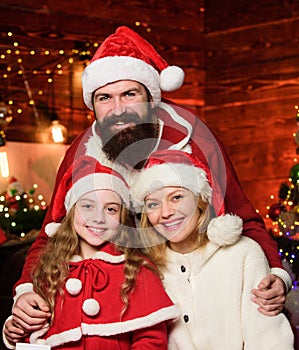 Being best Santa for them. Father Santa claus costume with family celebrating christmas. Lovely daughter with parents