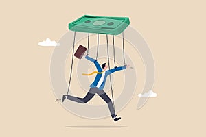Being controlled by money, capitalism, greedy working environment, slavery, decision manipulation or bribery and corruption photo