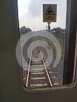 being in the last train car with a straight view of the railroad