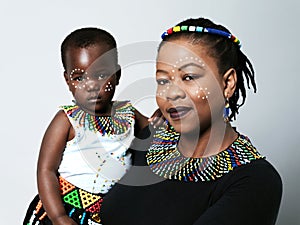 Being a mother is truly a blessing. Studio portrait of a cheerful middle aged woman holding her baby daughter while