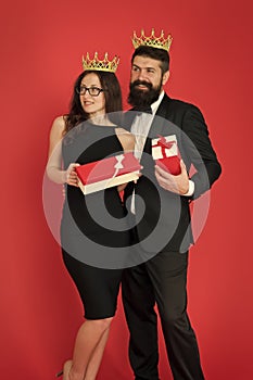 Being recognised and proud. Proud couple got presents. Sensual woman and bearded man wear crowns. Pride and vanity photo