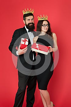 Being recognised and proud. Proud couple got presents. Sensual woman and bearded man wear crowns. Pride and vanity photo