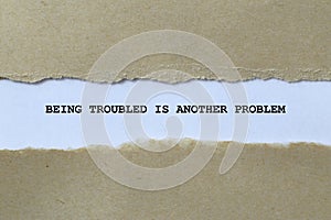 being troubled is another problem on white paper