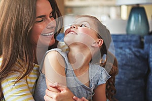 Being your mom is the best gift in the world. a mother and her daughter bonding at home.