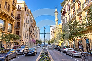 Beirut, Lebanon - Feb 5th 2018 - Amazing very modern area in Beirut downtown, cars, flowers, mosque in the background, french desi