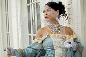Bejeweled Asian Woman in Elegant Dress