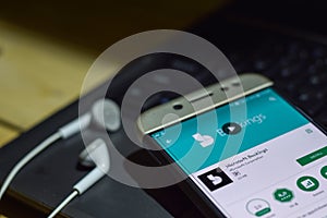 Microsoft Bookings dev application on Smartphone screen.