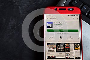 The Washington Post dev app on Smartphone screen.