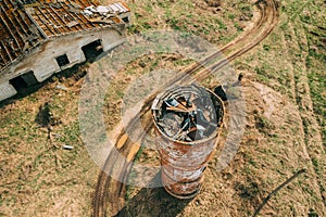 Belarus. Aerial View Of Abandoned Ruined Water Tower Near Farm In Chernobyl Zone. Chornobyl Catastrophe Disasters