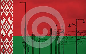 Belarus flag with tram connecting on electric line with blue sky as background, electric railway train and power supply lines