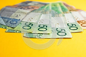 Belarusian rubles and coins on a colored background photo