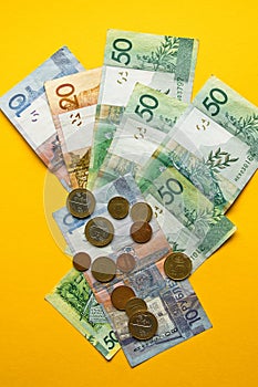 Belarusian rubles and coins on a colored background photo