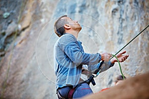 Belayer with the rope