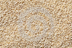 Belboula, dried barley grits full frame close up as background photo