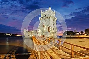 Belem Tower on the bank of the Tagus River in twilight. Lisbon, Portugal