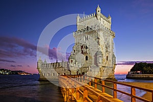 Belem Tower on bank of Tagus River in twilight. Lisbon, Portugal