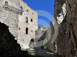 Belfort Ruins or Belfort Castle (Burg Belfort oder Burgruine Belfort) over the river Albula or Alvra, Surava