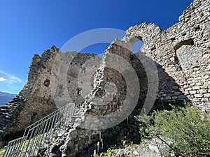 Belfort Ruins or Belfort Castle (Burg Belfort oder Burgruine Belfort) over the river Albula or Alvra, Surava